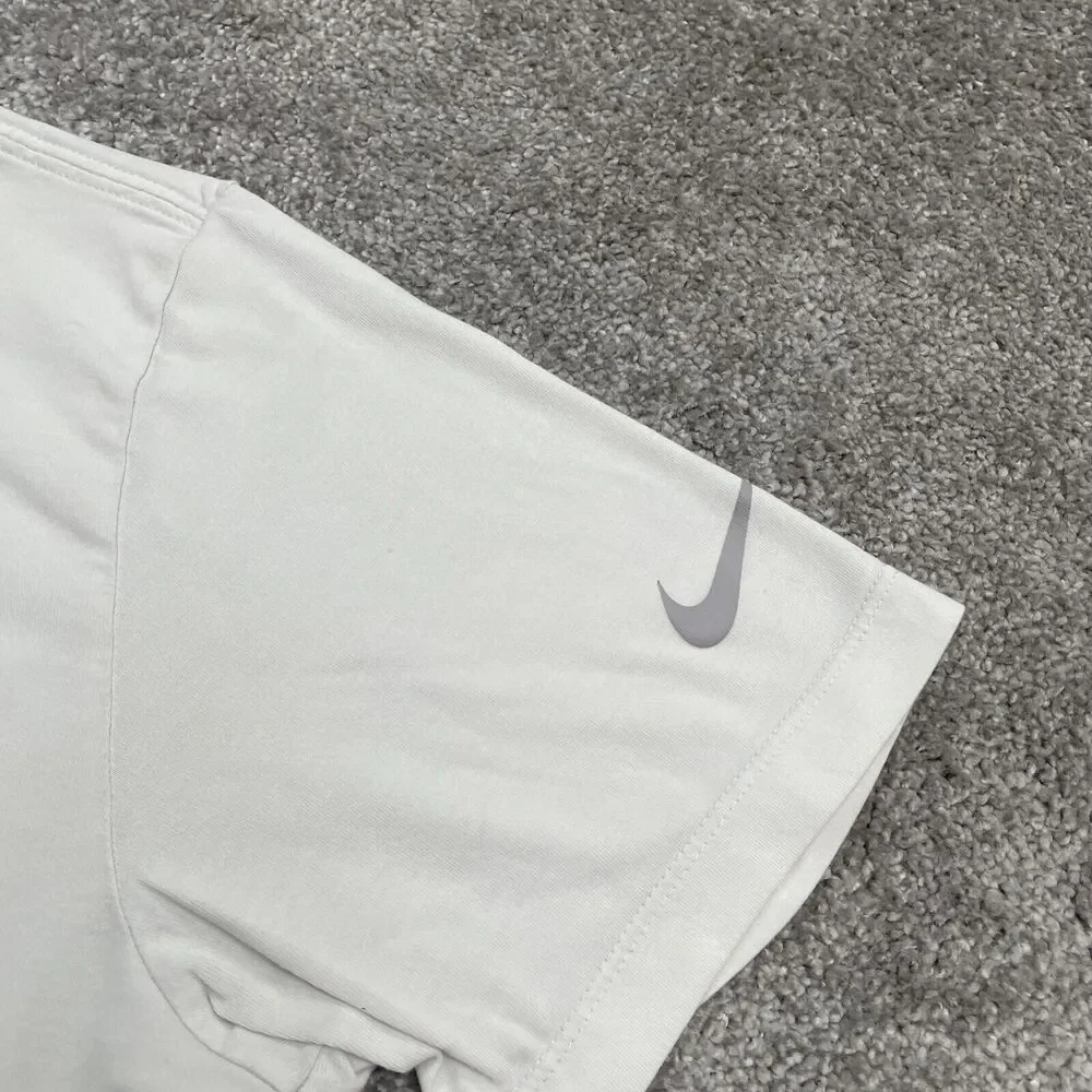 The Nike Tee Dri-Fit Graphic T-Shirt Mens Medium White Crew Neck Short Sleeve